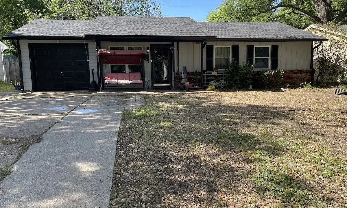 Asphalt Shingle Roof Repair crew at work on a residential roof in Haines City